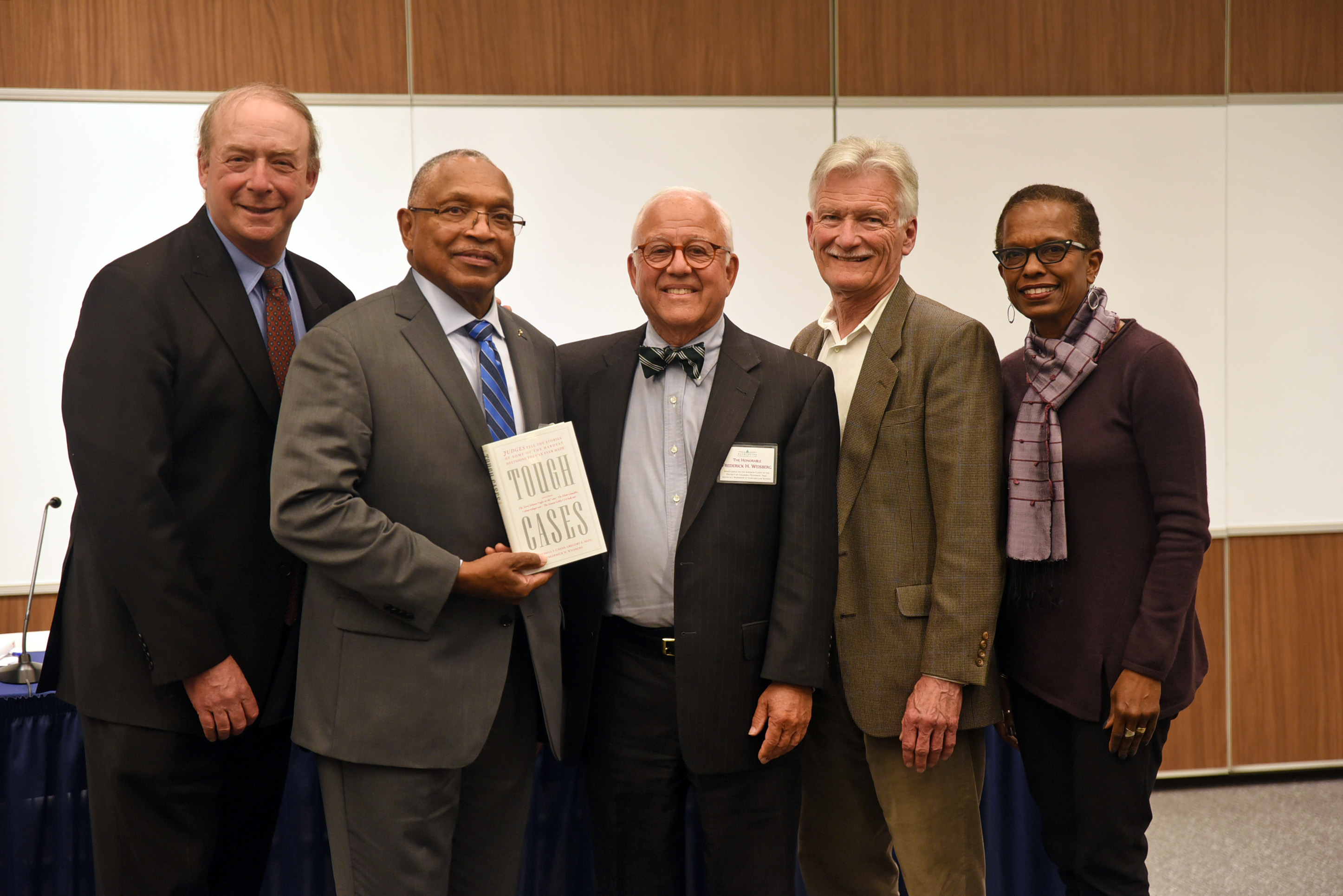 Judges Russell F. Canan, Reggie B. Walton ’74, Frederick H. Weisberg, and Gregory E. Mize with Professor Angela Davis.