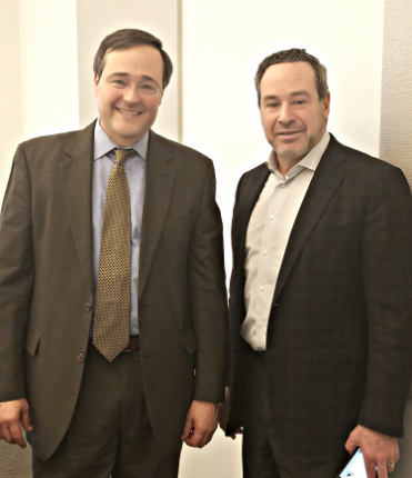 David Frum, former Speechwriter for President George W. Bush and currently Senior Editor for the Atlantic Magazine poses with Prof. Laguarda.