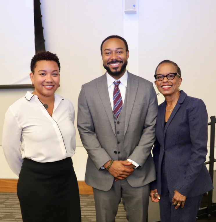Assistant Dean for Diversity, Inclusion, and Affinity Lisa Sonia Taylor, left, with keynote speaker Professor Justin D. Hansford, executive director of the Thurgood Marshall Civil Rights Center at Howard University, and Professor Angela J. Davis. 