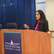 Vanita Gupta giving a keynote address