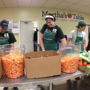 Assisting with meal preparation at Martha's Table