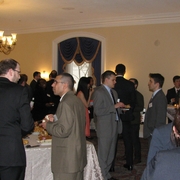 Students and alumni at reception.