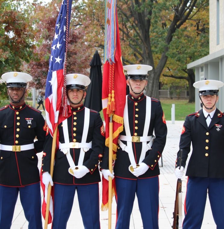 The ceremony included a presentation of the flag by a U.S. Marine color guard. 
