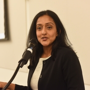 Vanita Gupta, Principal Deputy Assistant Attorney General at the DOJ, giving a keynote speech
