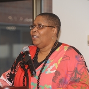 Sherry speaking at the 2010 PASOS Graduation Celebration.