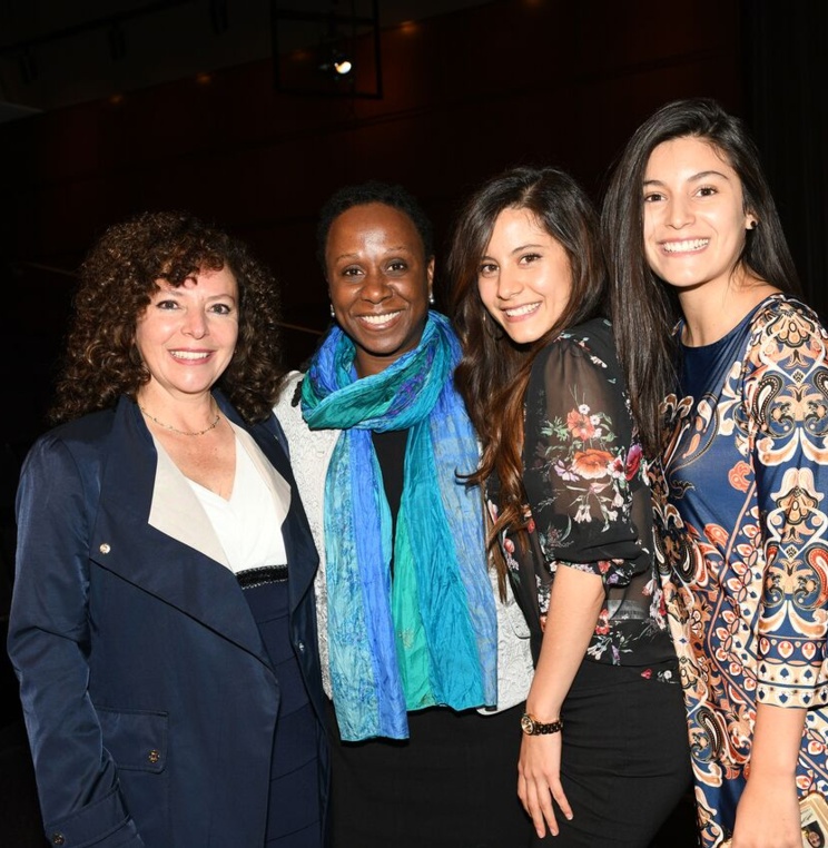 AUWCL student and family with Dean Camille Nelson