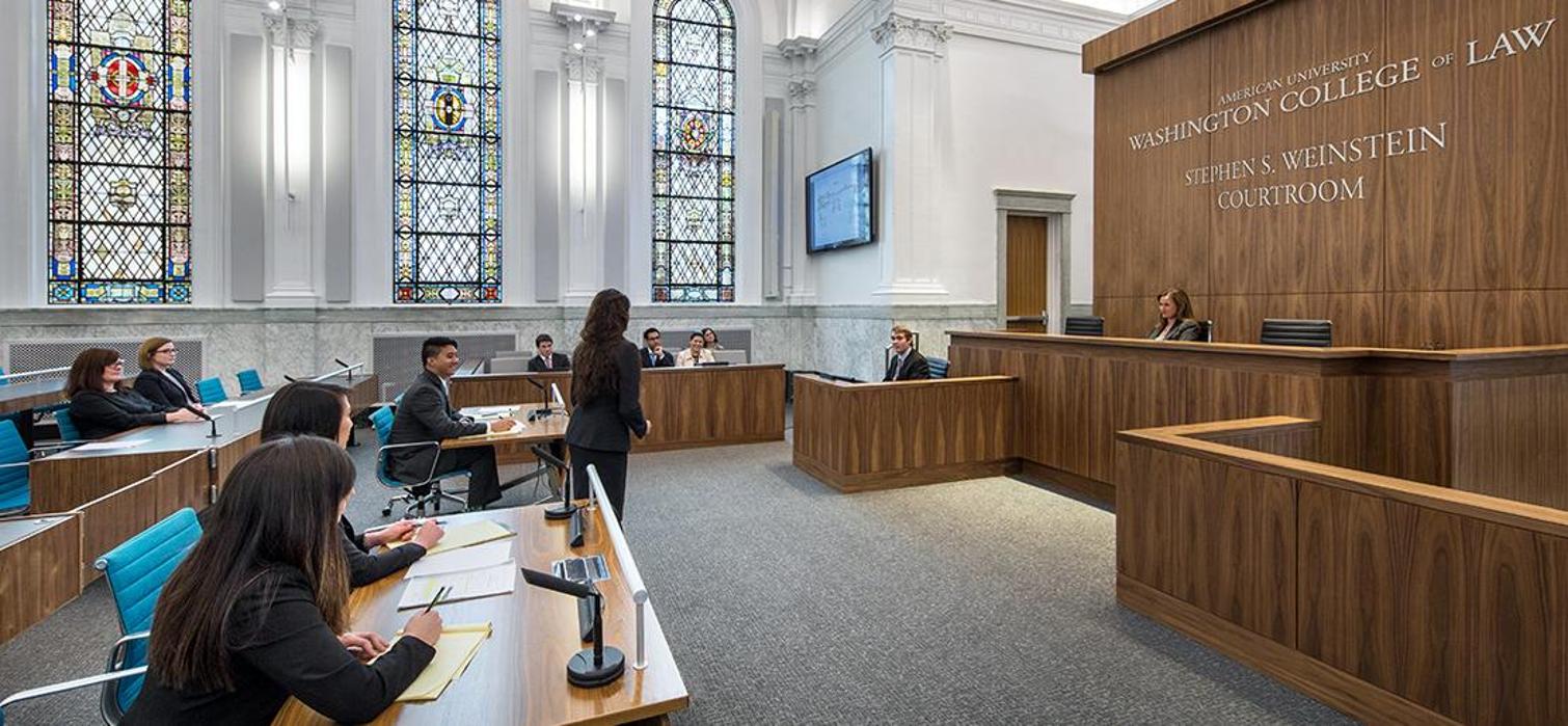 Students practice advocating to a judge in the Weinstein Courtroom at American University Washington College of Law