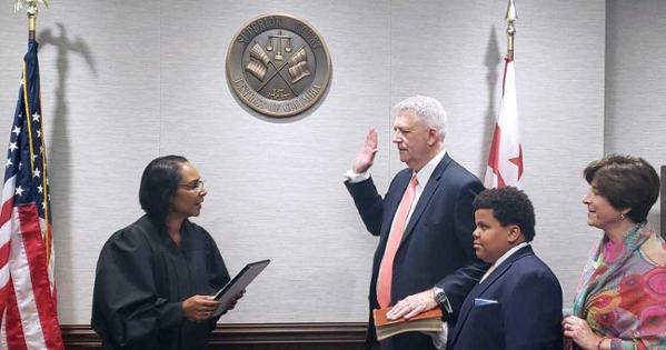 Judge Robert J. Hildum being sworn in. Judge Robert J. Hildum being sworn in.
