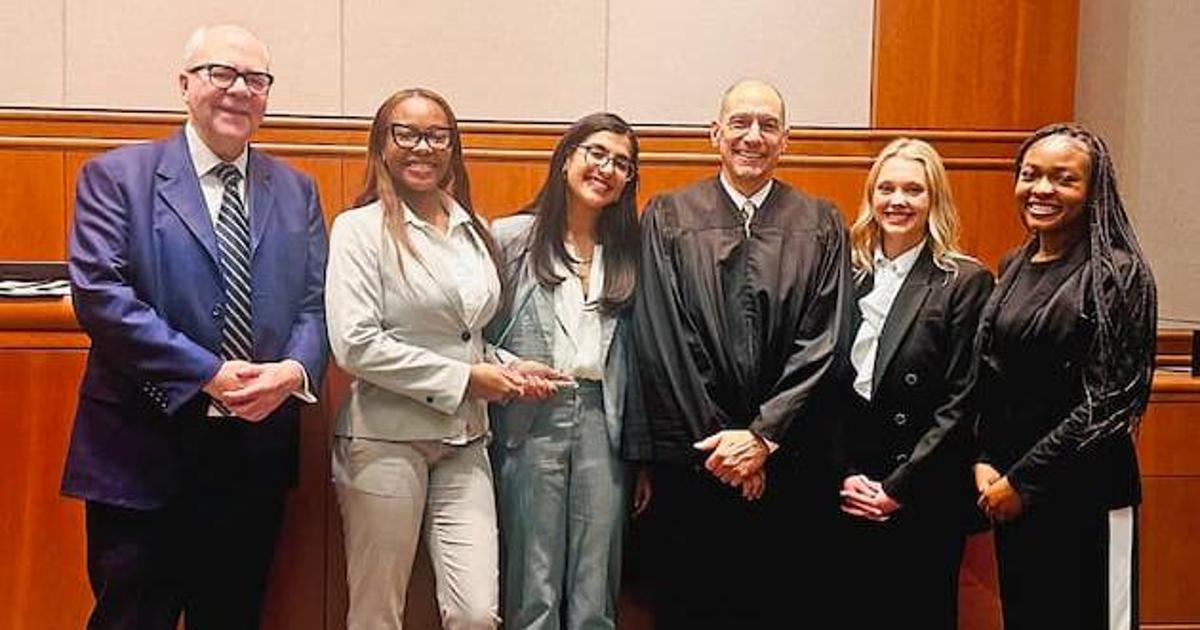 St. John's team from left to right: Peter James Johnson, Jr. (son of competition eponym), London Henderson (3L), Angelica Afanador (2L), Justice David J. Kirschner (Queens County Supreme Court), Hannah Hofmann (3L), and Ruth Chi (2L) St. John's team from left to right: Peter James Johnson, Jr. (son of competition eponym), London Henderson (3L), Angelica Afanador (2L), Justice David J. Kirschner (Queens County Supreme Court), Hannah Hofmann (3L), and Ruth Chi (2L)