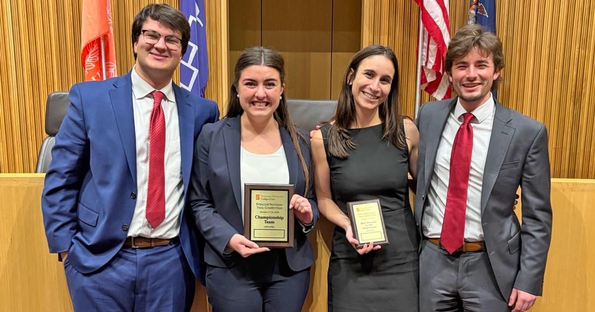 Syracuse team from left to right: Zachary Buckler (2L), Katharine Cuneo (3L), Evangelia Gavrilos (2L), and Samuel Mercer (2L) Syracuse team from left to right: Zachary Buckler (2L), Katharine Cuneo (3L), Evangelia Gavrilos (2L), and Samuel Mercer (2L)