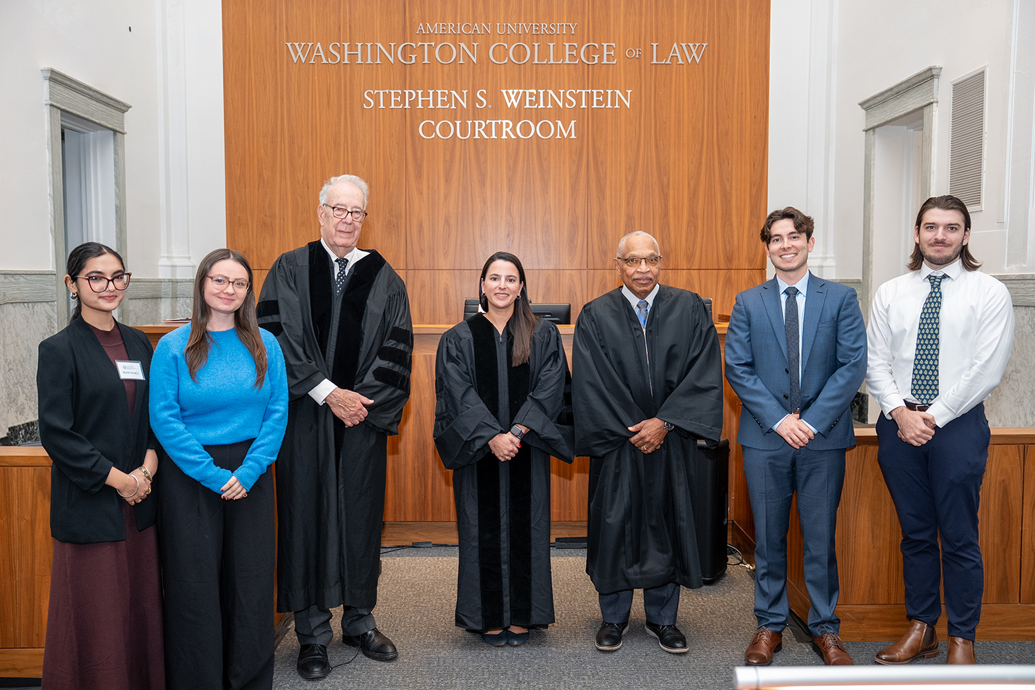 From left to right: Noor Chawla, Madyson Brown, Judge Timothy Dyk, Judge Loren AliKhan, Judge Reggie Walton, Jack Passero, and Jackson Newman. From left to right: Noor Chawla, Madyson Brown, Judge Timothy Dyk, Judge Loren AliKhan, Judge Reggie Walton, Jack Passero, and Jackson Newman.